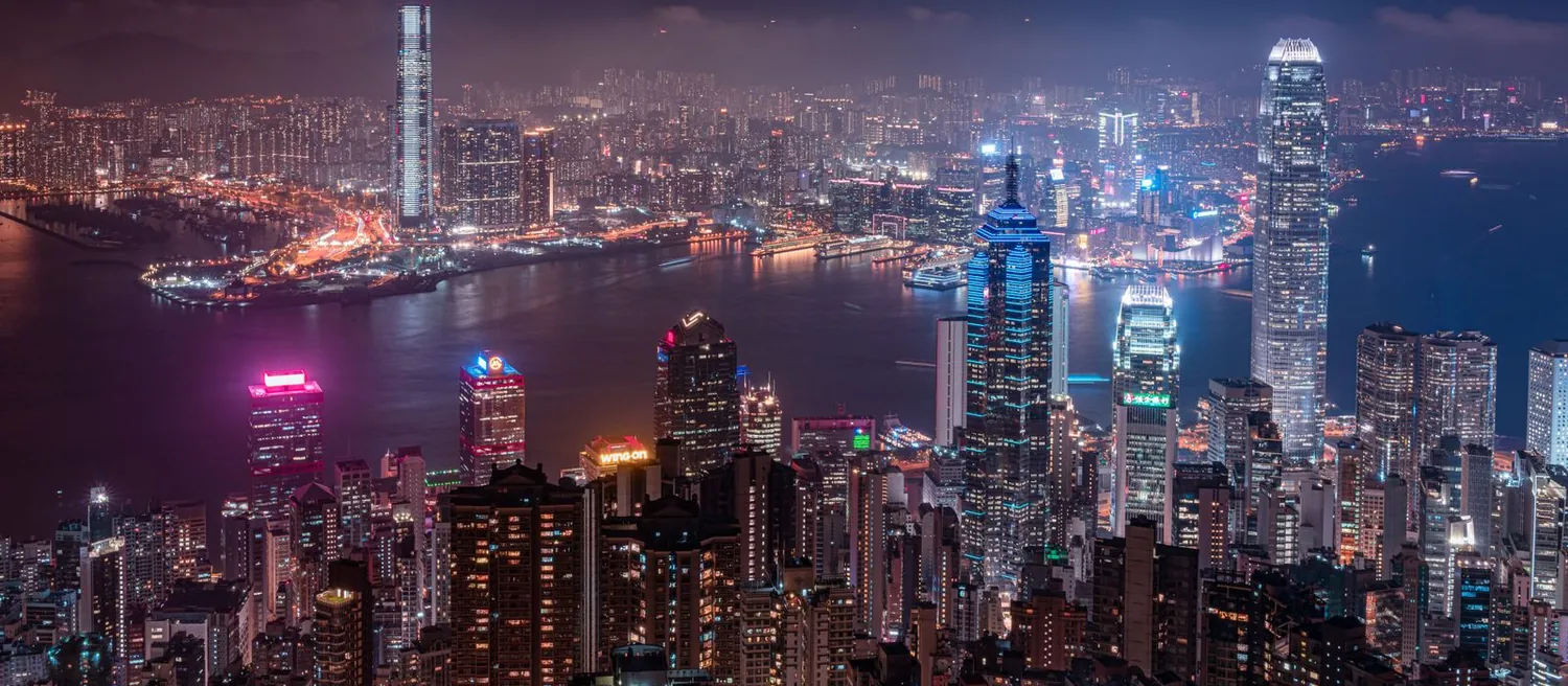 Hong Kong skyline across Victoria Harbour at night