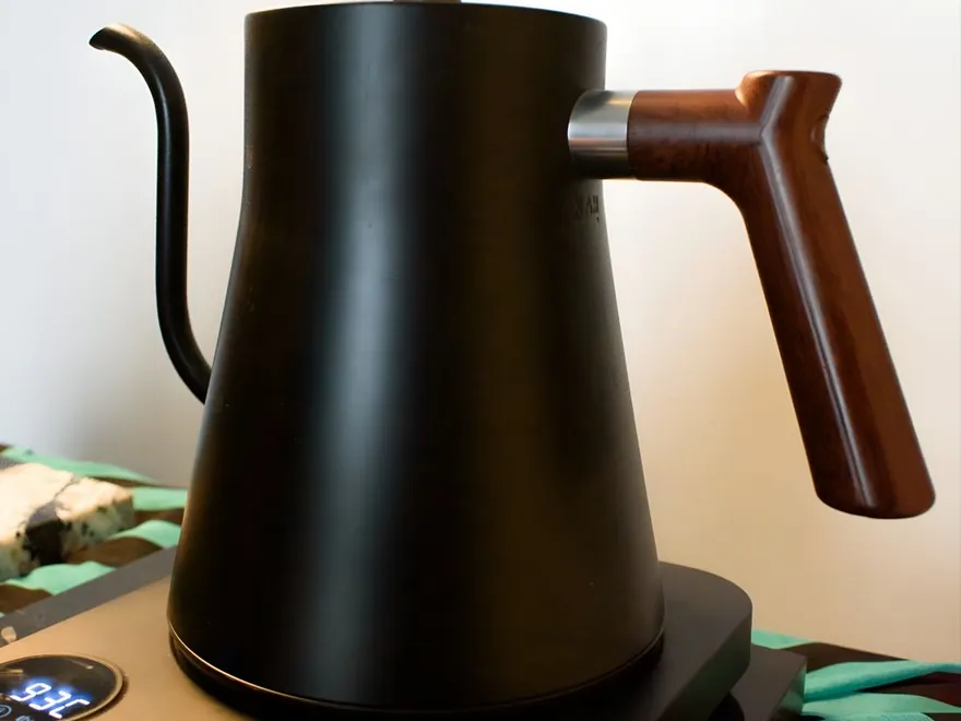 A modern electric kettle on its base